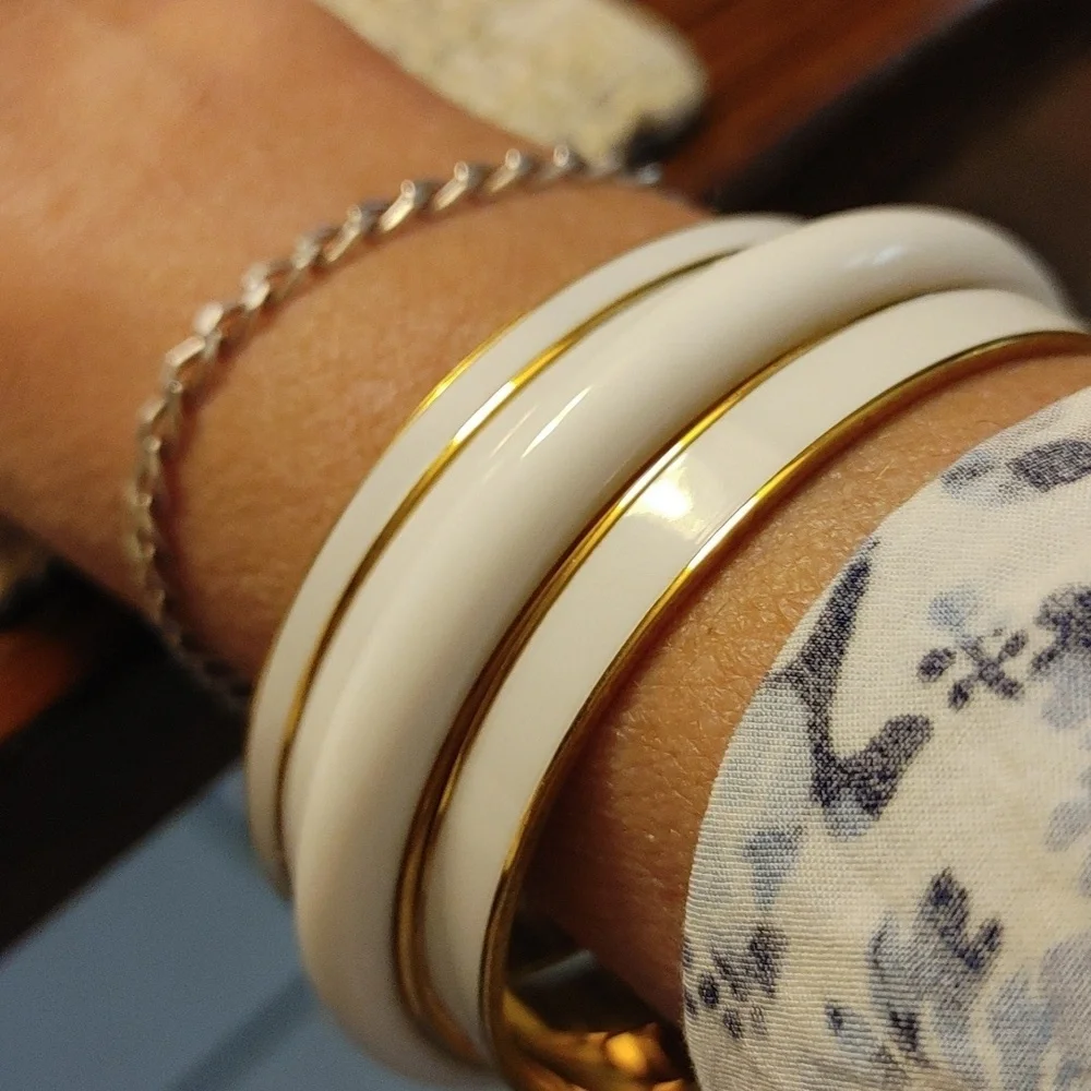 Vintage Set of Monet White & Gold Bangles